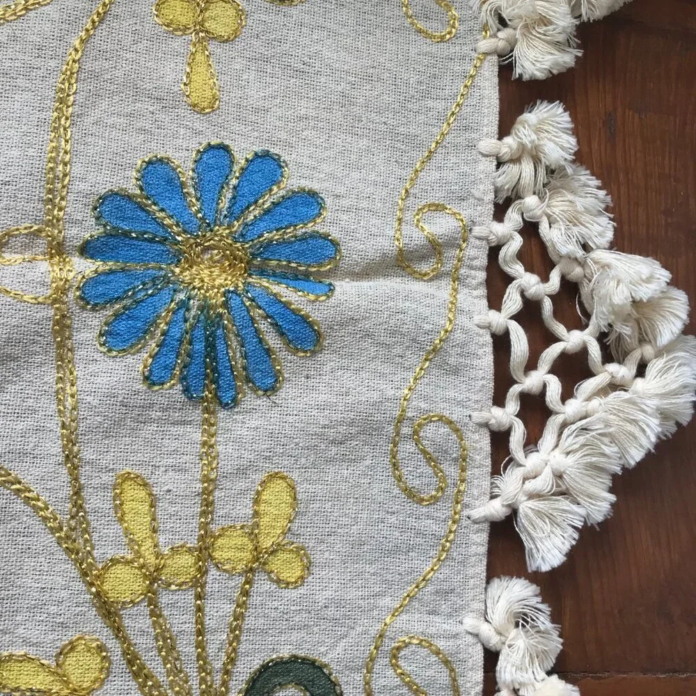 Decorative Turkish table runner with vibrant floral design.